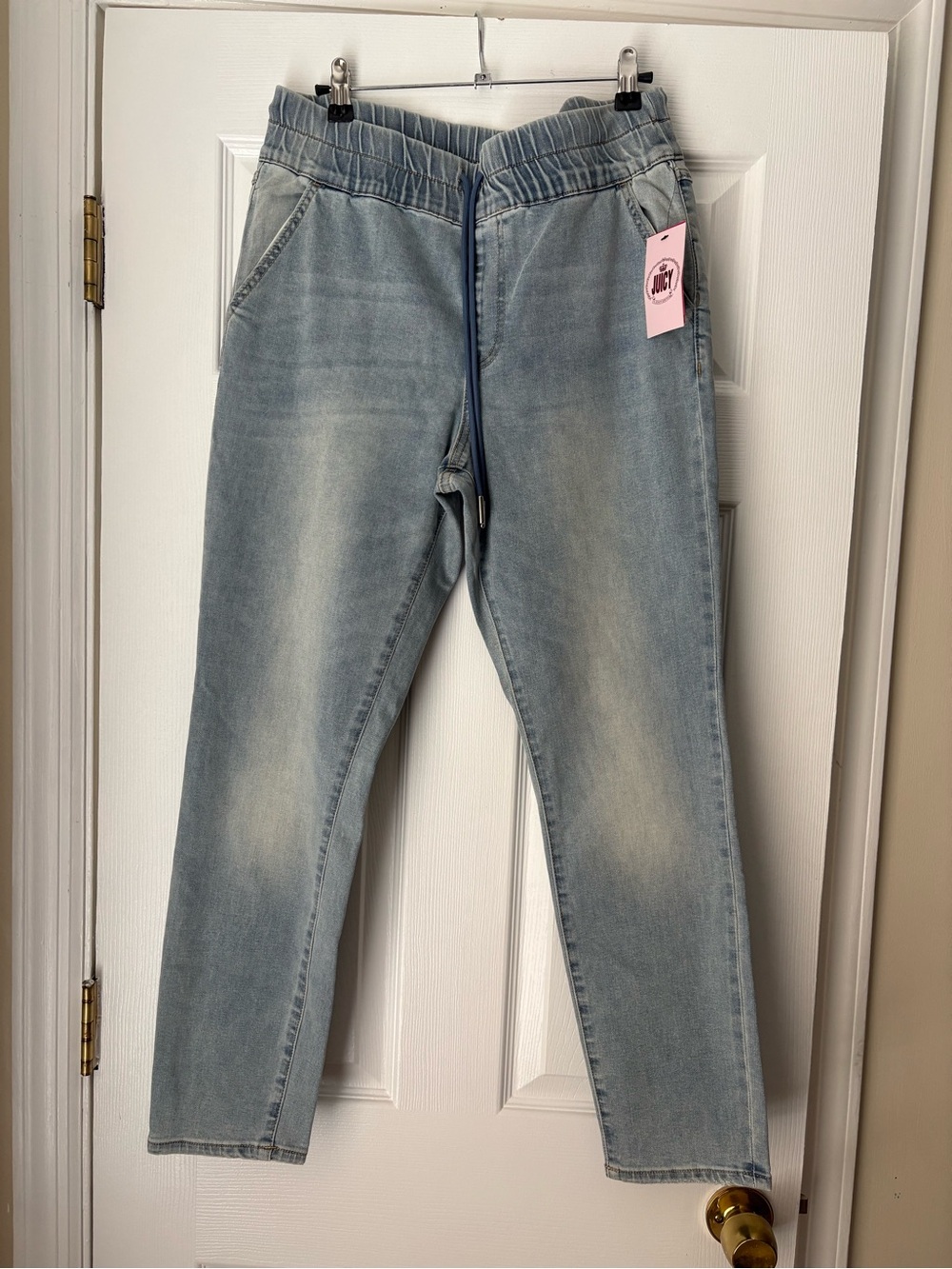 Juicy Couture Light Wash Denim Pants with Pink Logo Tag